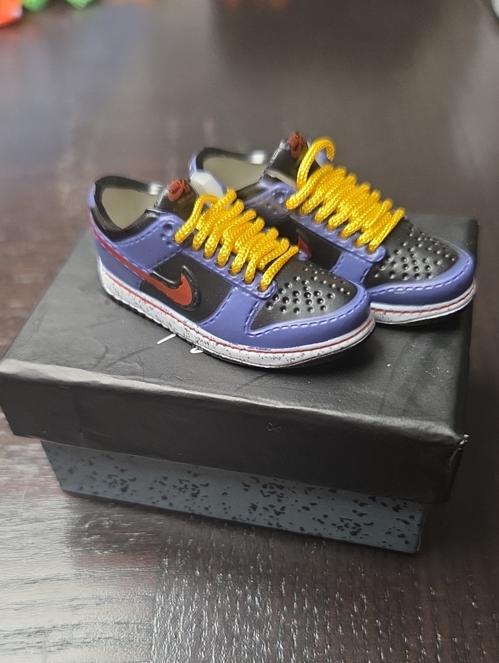 Nike Kids Sneakers in Purple, Black, Yellow and Red